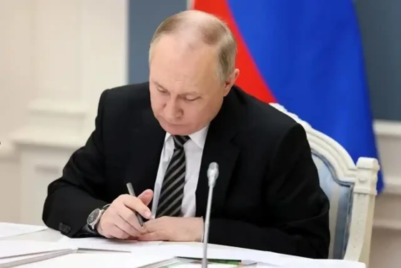 Путин