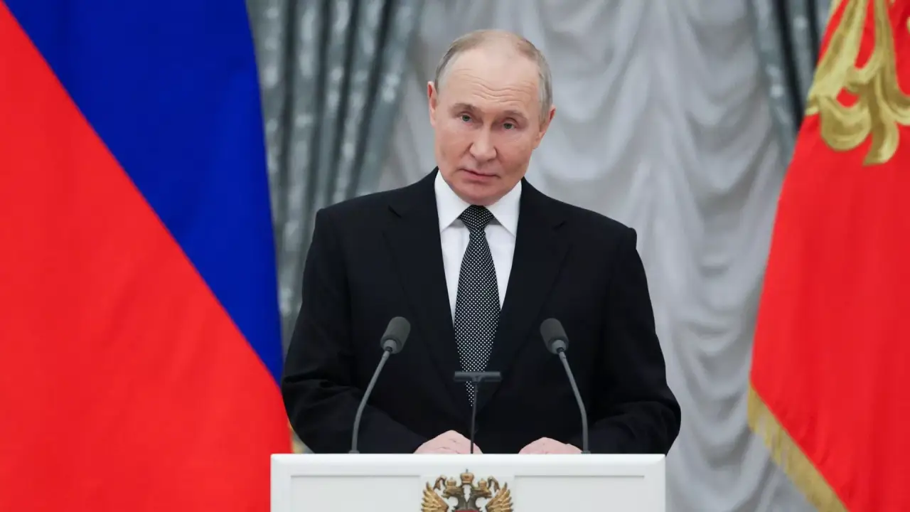 Путин