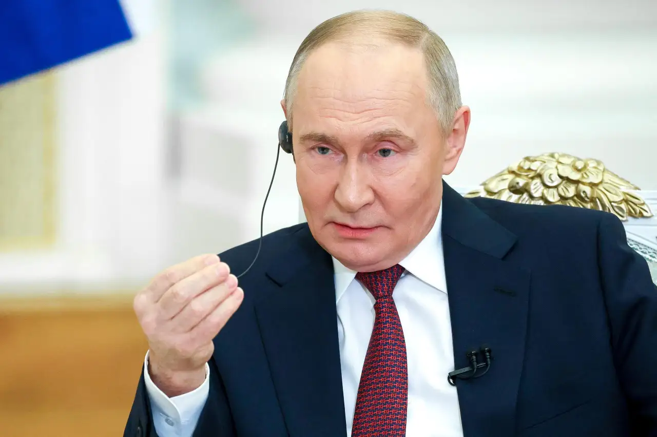 Путин